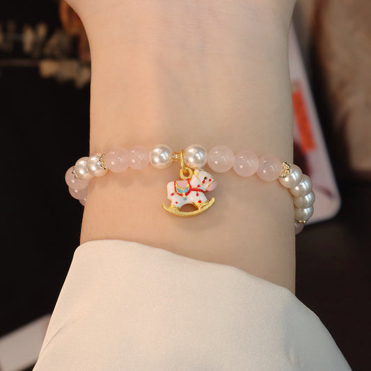 Rocking horse keeps the rosy hush — Bracelet