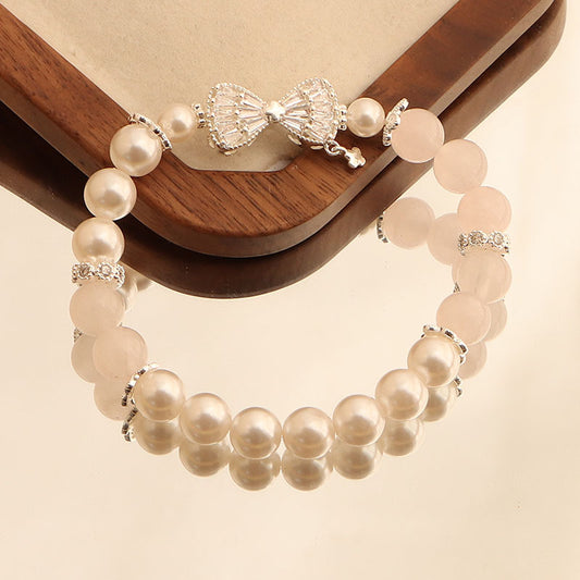 Pearl Waltz with a Pink Bow — Bracelet