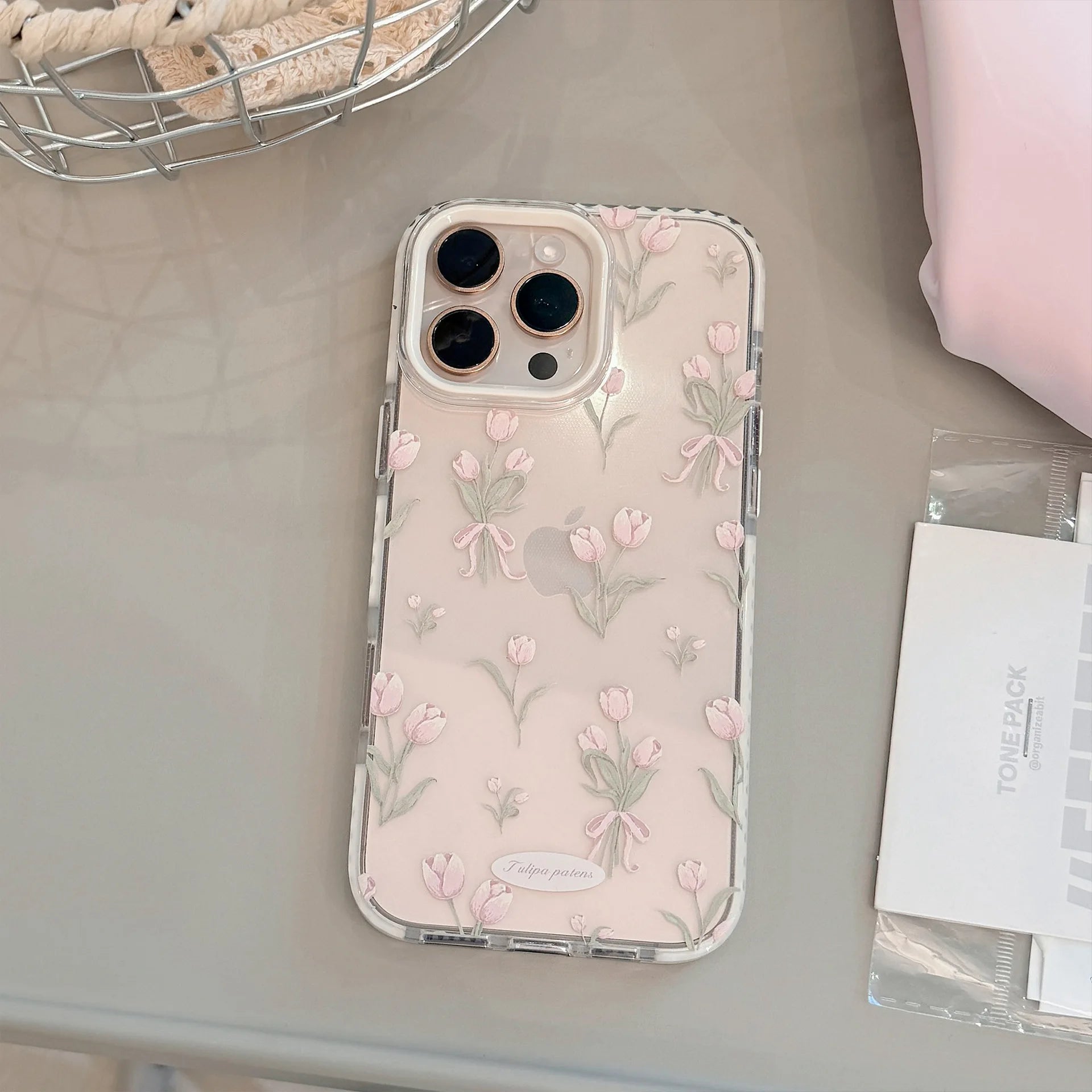 Add a touch of elegance with our Korean Transparent Pink Tulip Bouquet Phone Case! Designed for iPhone 12 to 16, this clear case beautifully showcases a floral design while offering shockproof protection.